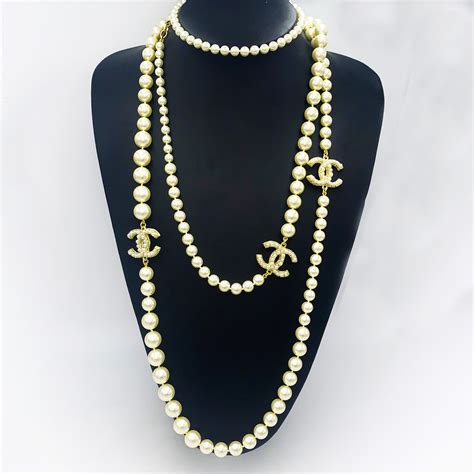 chanel pearl bow necklace|Chanel pearl necklace price list.